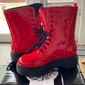 Size 7 Red combat boots. Brand new in box.